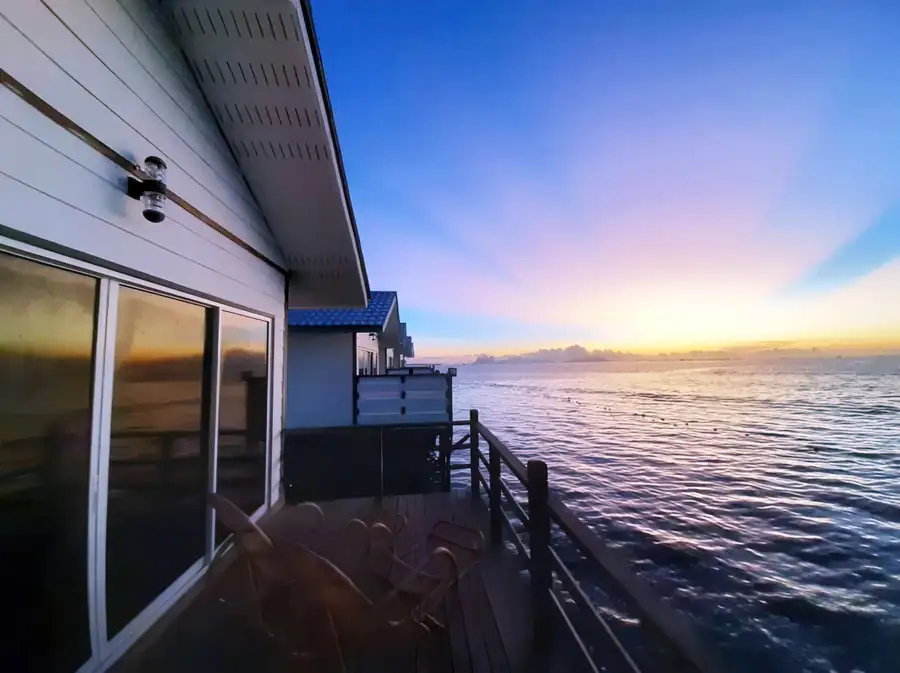 Perspective view of the overwater wooden bungalows at WB Shun Shun Water Bungalows